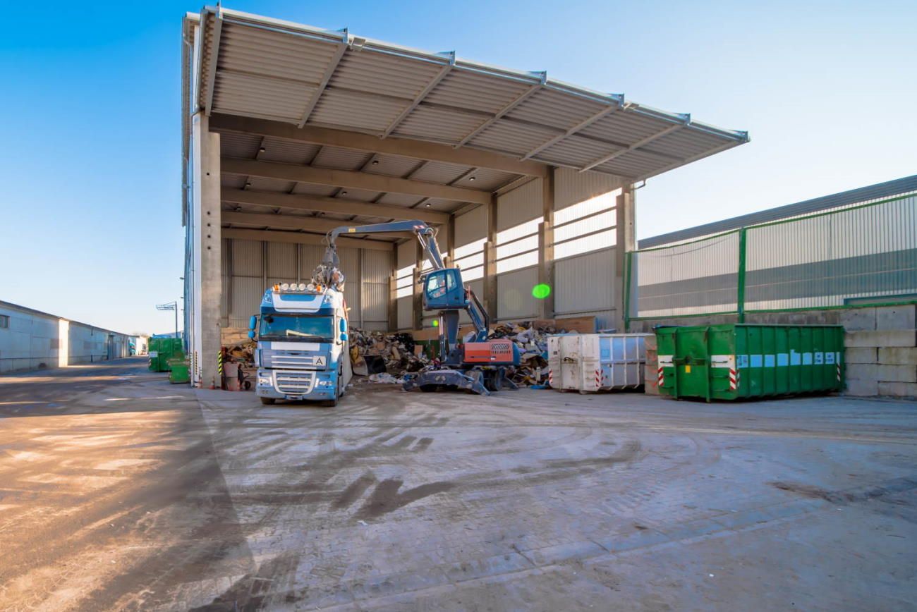Want It Gone crew loading junk removal truck in Ocala
